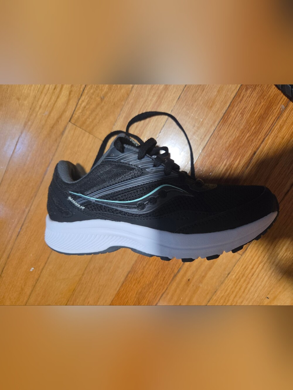 Saucony Men's Black Running Shoe with White Midsole